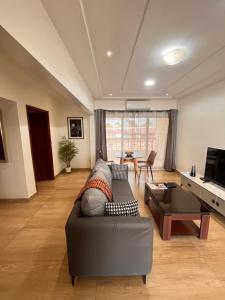 Μια τηλεόραση ή/και κέντρο ψυχαγωγίας στο Appartement moderne de standing au cœur de Lomé