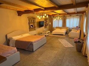 Postel nebo postele na pokoji v ubytování Villa Simona