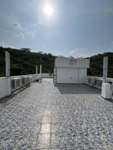 a building on top of a roof with a sky at Hotel Moon Mahal in Jaipur +4 photos