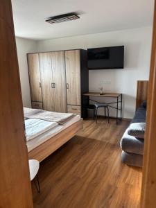 Postel nebo postele na pokoji v ubytování Appartement Steinbergrose