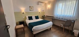 Postel nebo postele na pokoji v ubytování Hôtel Restaurant du Lac