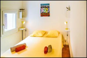 Postel nebo postele na pokoji v ubytování L’Hinerava – Charmant appartement cosy en centre-ville