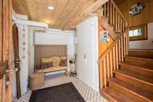 a staircase in a tiny house at La Providence in Morgins