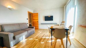 TV a/nebo společenská místnost v ubytování Casa Pozzallo Flavio - Affitti Brevi Italia