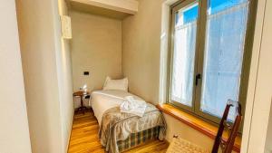 Postel nebo postele na pokoji v ubytování Casa Pozzallo Flavio - Affitti Brevi Italia