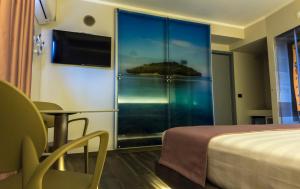 TV a/nebo společenská místnost v ubytování Hotel Pandora Residence