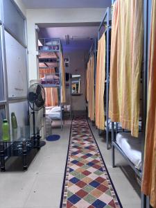 Ένα ή περισσότερα κρεβάτια σε δωμάτιο στο Luxe Sleep Dormitory +3 φωτογραφίες