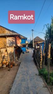 a street in a village with a sign that reads ramishi at Culture home, home stay in Bandīpur