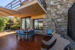 Balkón nebo terasa v ubytování Villetta con Giardino a pochi passi dalla Spiaggia