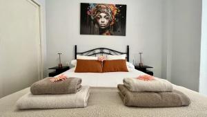 Ένα ή περισσότερα κρεβάτια σε δωμάτιο στο Sol y playa apartamento