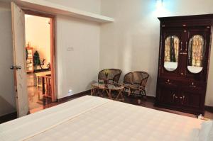 Ένα ή περισσότερα κρεβάτια σε δωμάτιο στο Camelia HomeStay