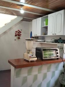 Kuchyň nebo kuchyňský kout v ubytování Habitación a muy buen precio 2x1 + 26 fotografií