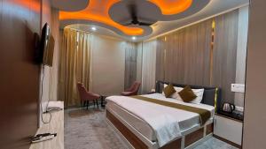 Postel nebo postele na pokoji v ubytování Hotel Anu