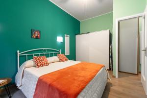 Postel nebo postele na pokoji v ubytování Bilocale moderno Isola-Garibaldi, 4 posti, WiFi veloce, Metro a 2 minuti