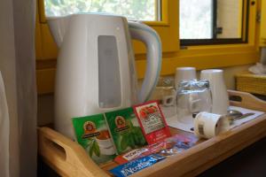 a kitchen counter with a coffee pot on top of it at Il-Wileg B&B in Qala