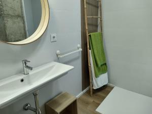a bathroom with a sink and a mirror at LUXURY APARTMENT SCIENCES CITY Valencia B in Valencia +19 photos