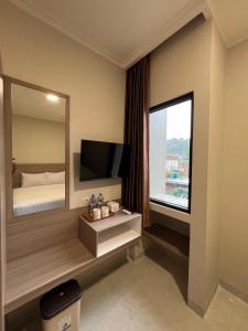 Μια τηλεόραση ή/και κέντρο ψυχαγωγίας στο INARA By Kiyana