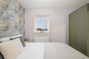 Ένα ή περισσότερα κρεβάτια σε δωμάτιο στο Milton Keynes 3BR,Spacious Home, Sleeps 5, Families Stays, Free Parking +34 φωτογραφίες