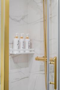 Ένα μπάνιο στο Milton Keynes 3BR,Spacious Home, Sleeps 5, Families Stays, Free Parking