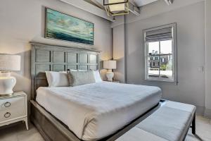 a bedroom with a large bed and a window at Parker's Collection Unit 8 in Savannah +24 photos