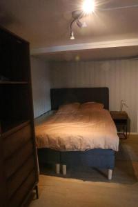 Postel nebo postele na pokoji v ubytování Central apartment in Lillehammer