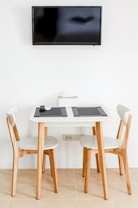 Μια τηλεόραση ή/και κέντρο ψυχαγωγίας στο Stay White Orchid