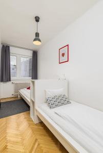 Postel nebo postele na pokoji v ubytování New Design Apartment by Gozsdu Court