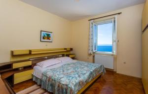 Ένα ή περισσότερα κρεβάτια σε δωμάτιο στο Feelgood apartment Opatija-Rijeka by Villas Guide