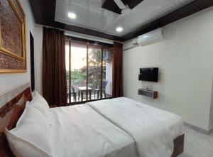 Fotografie z fotogalerie ubytování Vrindavan beach resort v destinaci Diveagar