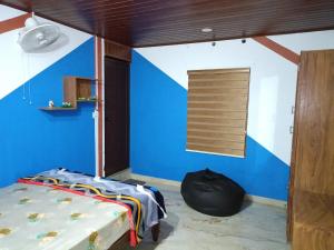 Postel nebo postele na pokoji v ubytování Cherukunnel jose