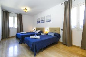 Postel nebo postele na pokoji v ubytování Villa BARLOVENTO SPA + 36 fotografií