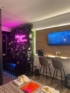 TV a/nebo společenská místnost v ubytování Armonia Serenity Room Politeama