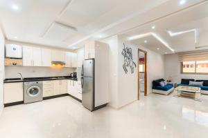 Η κουζίνα ή μικρή κουζίνα στο Modern and cozy apartment