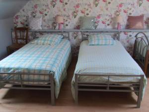 Postel nebo postele na pokoji v ubytování Maison avec jardin clos, proche de Montreuil sur Mer, activités familiales, animaux acceptés, wifi inclus - FR-1-376-97