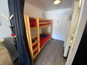 Ένα ή περισσότερα κρεβάτια σε δωμάτιο στο Superbe studio en coeur de station