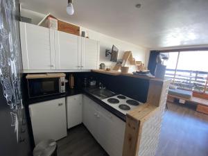 Η κουζίνα ή μικρή κουζίνα στο Superbe studio en coeur de station