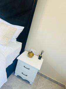 Ένα ή περισσότερα κρεβάτια σε δωμάτιο στο Emmanique Guesthouse