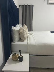 Ένα ή περισσότερα κρεβάτια σε δωμάτιο στο Emmanique Guesthouse +3 φωτογραφίες