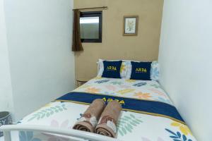 Voodi või voodid majutusasutuse ELBA Guesthouse Near UNNES by ARBA toas