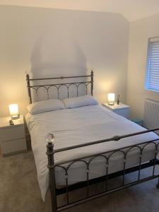 Ένα ή περισσότερα κρεβάτια σε δωμάτιο στο Prestwich comfort