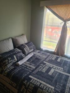 Ένα ή περισσότερα κρεβάτια σε δωμάτιο στο Uptown Inn GuestHouse +22 φωτογραφίες