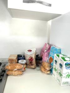 Η κουζίνα ή μικρή κουζίνα στο White Home Forli Centro +7 φωτογραφίες