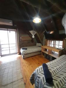 Postel nebo postele na pokoji v ubytování African Bush Escape + 61 fotografií