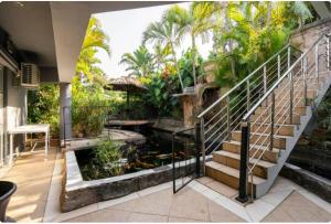 Κήπος έξω από το Coastal Boutique Hotel