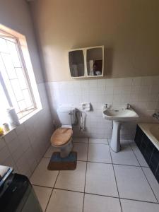 Koupelna v ubytování Uptown Inn GuestHouse