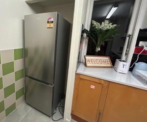 Η κουζίνα ή μικρή κουζίνα στο Northcote Holiday Home Rooms +11 φωτογραφίες