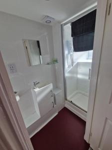 Koupelna v ubytování The Swan Hotel + 61 fotografií