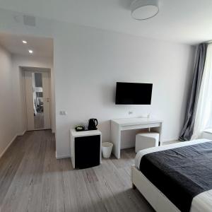 TV a/nebo společenská místnost v ubytování Osilo Rooms