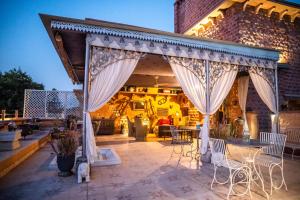 Posezení v ubytování Bungalow 2 Raikabagh