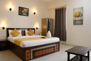 Ένα ή περισσότερα κρεβάτια σε δωμάτιο στο Magnet Residency